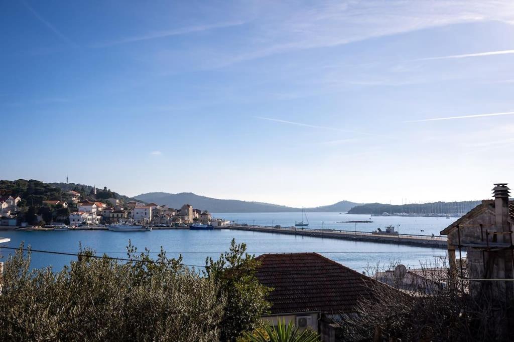 View over the rooftops to Rogoznica bay